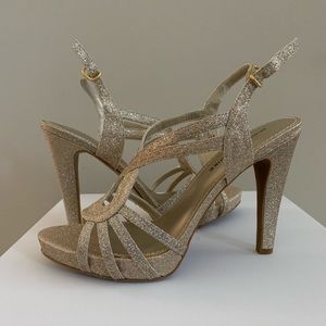 Beautiful gold strappy heels.